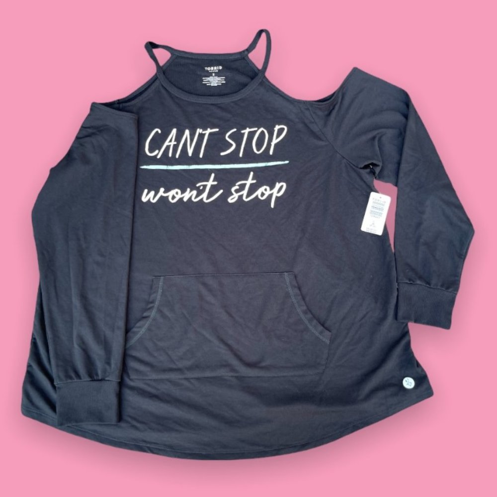 NWT Torrid long sleeved black cold shoulder active top with kangaroo pocket